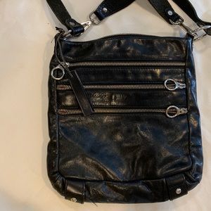 Tano -crossbody purse. Like new. Black leather